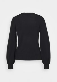 Musta pusero pyöreällä pääntiellä, pitkillä liehukehihnoilla ja resoroiduilla hihojen suilla. Pehmeä rakenne ja istuva vyötärö sekä sileä selkäosa.