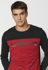 Koroshi Maglietta Donna A Maniche Corte Con Stampa Leopardo Glitterato E Logo, Girocollo, Colore Nero, Casual E Brillante