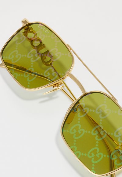Gucci UNISEX - Slnečné okuliare - gold-coloured