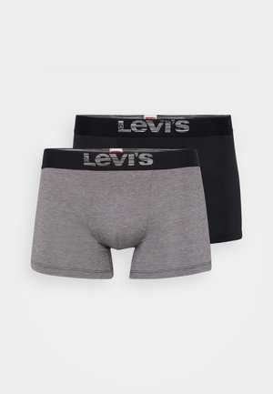 Slips Levi's in nero e grigio. Morbido misto cotone, vita elasticizzata con logo, design aderente, gambe corte e cuciture piatte.