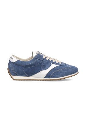 Blue suede sneaker features white accents, a textured surface, round toe, and beige laces; includes brown rubber sole with traction.