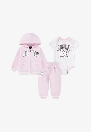 Pink three-piece baby outfit consisting of a zip-up hoodie with "JORDAN" text, striped onesie, and matching pants with "23" detail.