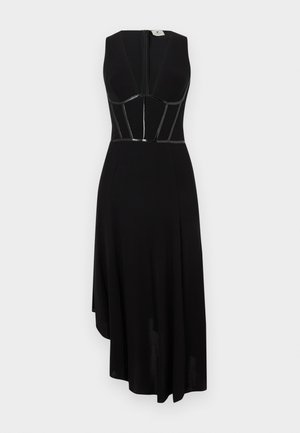 Vestido negro con un escote en V profundo, cuerpo ajustado con detalles brillantes y un dobladillo asimétrico. Fabricado en tejido suave.
