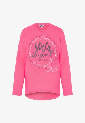 Pink sweatshirt featuring a round neckline, long sleeves, and a high-low hem. Decorated with silver graphic text and curved patterns.