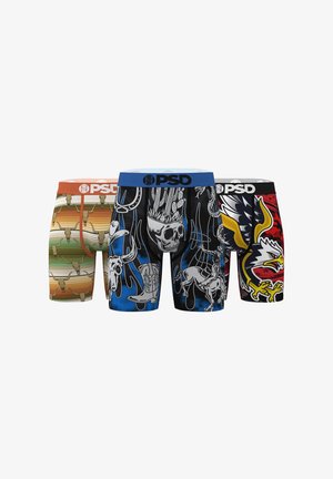 Three pairs of men's boxer briefs with bold western designs: tan skulls on stripes, blue with skull and cowboy boots, and red with an eagle graphic.