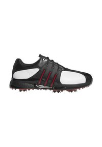 Black and white golf shoe with red accents, lace-up closure, and cleated sole for traction, shown from the side on a white background.