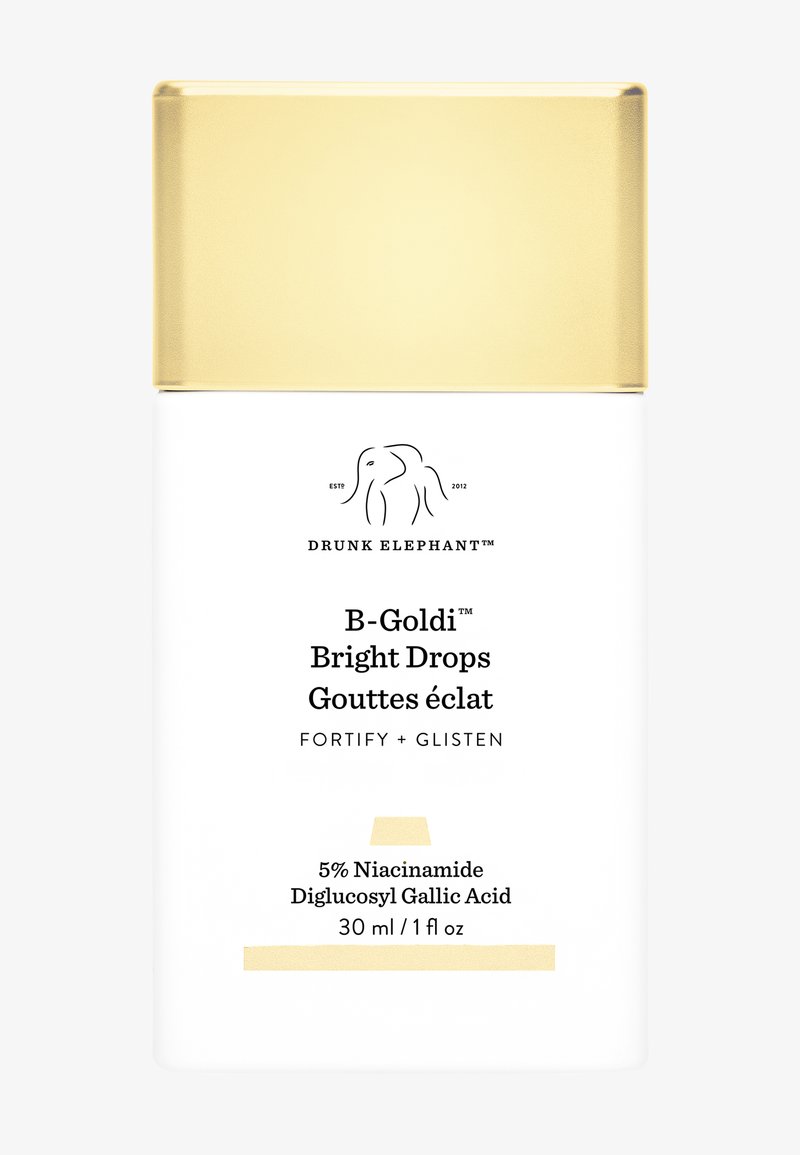 Drunk Elephant B-Goldi Bright Drops in einer weißen Flasche mit einem goldenen Deckel. Enthält das Logo der Marke, den Produktnamen und die Inhaltsstoffdetails auf dem Etikett.