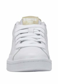 White K-Swiss sneakers with a smooth leather upper, flat laces, a gold logo on the tongue, and a textured rubber sole.