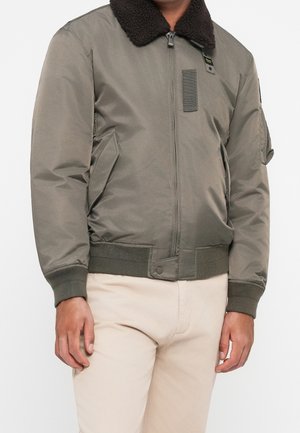 Talvitakki - dark green