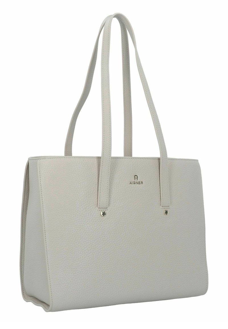 Hellgraue Leder-Tasche mit strukturiertem Design, zwei oberen Griffen und dezent eingeprägtem Logo. Verfügt über eine strukturierte Oberfläche und metallische Akzente.