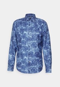 Långärmad skjorta i ljusblått tyg med ett mörkblått bladmönster, spetsig krage och knäppning framtill. Mjuk textur och vanlig passform.