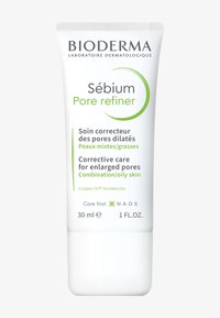 Bioderma Sébium Pore Refiner, tubetto bianco con accenti verdi, 30 ml, progettato per pelli miste/grasse, si concentra sui pori dilatati.