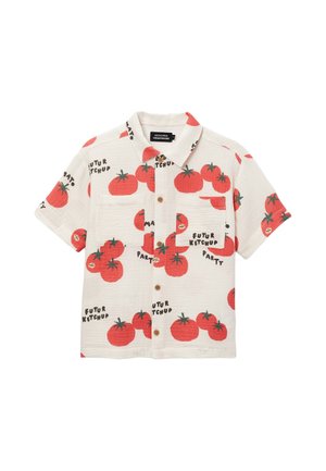 Chemise à manches courtes avec boutons, imprimés rouges de tomates et texte noir indiquant "Futur Ketchup Party" sur fond blanc. Deux poches avant.