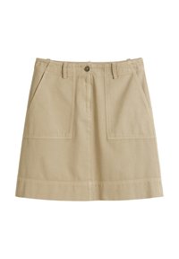 Bežová bavlněná sukně s předními knoflíky, poutky na opasek, dvěma velkými náprsními kapsami a rovním lemem.