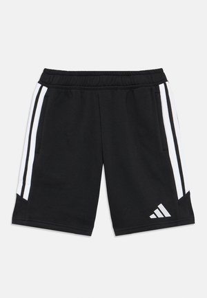 Shorts de sport noirs avec une taille élastique, comportant des rayures blanches sur les côtés et un petit logo en bas à gauche. Matière douce en mélange de coton.
