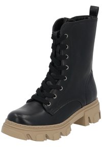 Stivale in pelle nera con lacci, punta rotonda, suola in gomma beige spessa e occhielli in metallo. Presenta un tassello sul retro per facilitare la calzata.