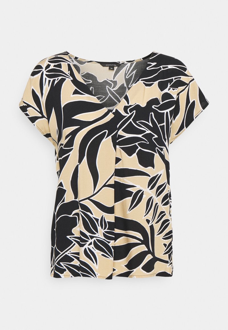 Blouse beige et noire à manches courtes, col en V, avec un grand imprimé abstrait de feuilles et une coupe ample.