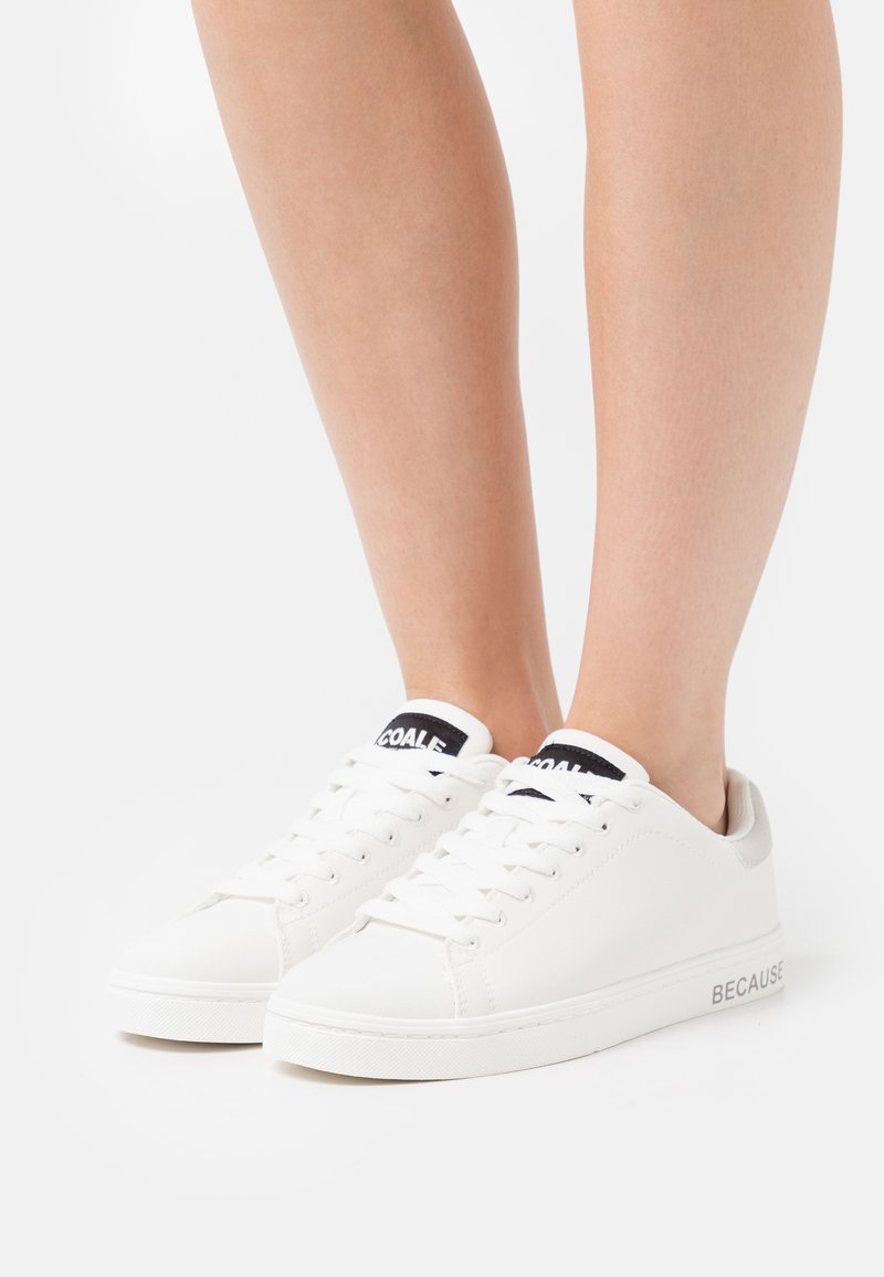 white basic trainers