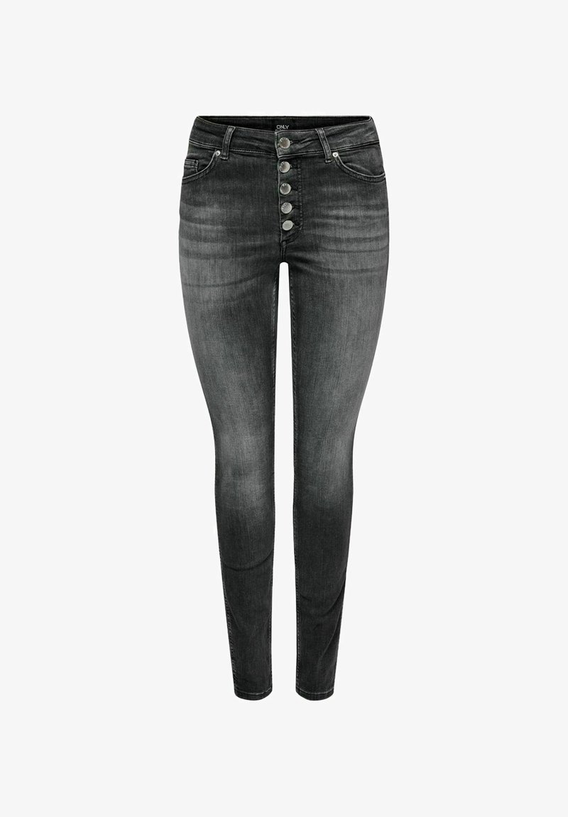 Jean skinny noir taille haute avec fermeture à cinq boutons sur le devant et texture délavée sur les cuisses et les genoux.