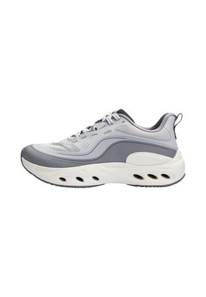 Gray and white athletic sneaker with thick sole featuring ventilation holes, lace-up closure, and padded ankle collar.