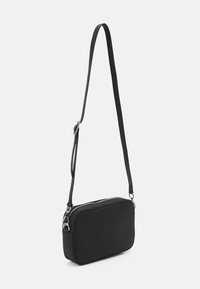 Lacoste Borsa a tracolla - black