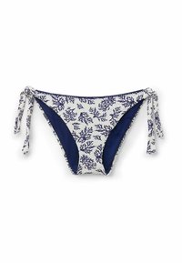Bikiniunderdel med ett korallmönster i marinblått på en ljus bakgrund. Sidsnören för justering, med en slät textur och fodrad insida.