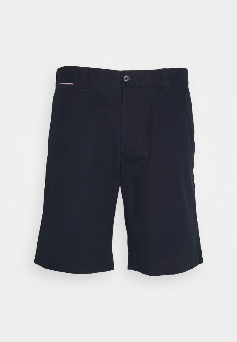 Pantaloni corti blu realizzati in cotone. Presentano una parte anteriore piatta, due tasche laterali e orli arrotolati. Design semplice con dettagli di cucitura minimi.