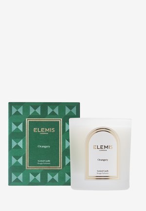 Elemis London Orangery duftlys i en frostet glasbeholder ved siden af æsken med grøn geometrisk mønster.
