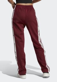 adidas Originals ADICOLOR CLASSICS ADIBREAK - Tracksuit bottoms - shadow red