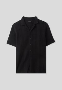 Maglietta nera a maniche corte con colletto, caratterizzata da un design a maglia testurizzata e a motivi, con chiusura a bottoni frontale. Taglia XL.