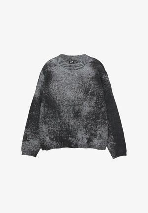Maglione lavorato a maglia nero e grigio con scollatura tonda, vestibilità ampia e maniche lunghe con motivo strutturato su tutta la superficie.