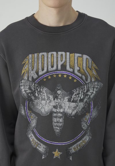 Gray sweatshirt featuring a large graphic of a moth, surrounded by a circular design with stars and the word "KOOPLES" in gold and white.