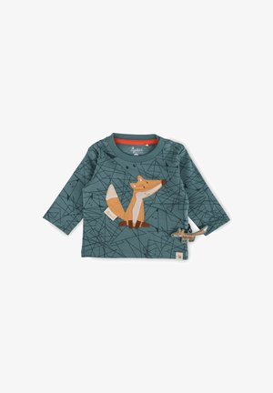 Langärmliges Shirt aus türkisfarbener Stoff mit einem Fuchsdesign, geometrischen Mustern und einem orangefarbenen Halsauschnitt. Inklusive passendem Fuchs-Spielzeug-Akzent.