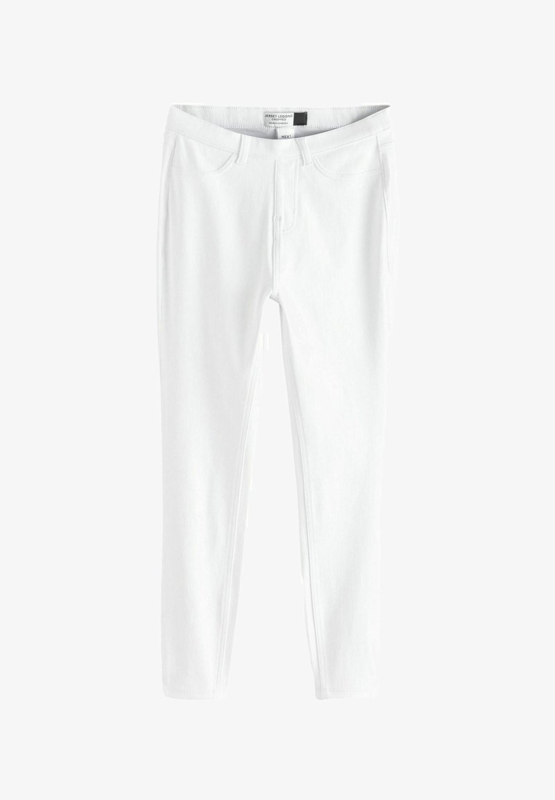 Fehér rövidített jersey leggings elülső zsebekkel és övbújtatókkal, karcsúsított szabásban tervezve.