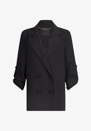 Blazer negro de doble botonadura con un diseño estructurado, solapas con muesca, mangas remangadas y una tela suave y texturizada.