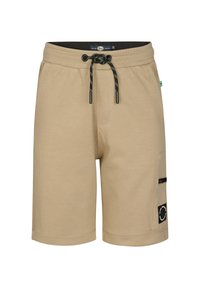 Beige sweatshorts lavet af blødt stof, med elastisk talje og sort snøre, sidelommer og en patch-detalje.