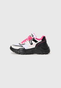 Chunky sneaker with black sole, white and black upper, pink laces, pink interior, and "Versace Jeans Couture" branding on side and heel.