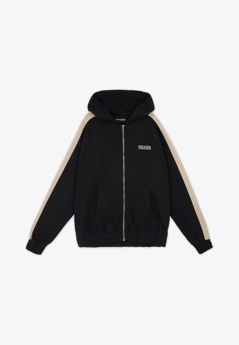 Sweat à capuche noir zippé avec des rayures beiges sur les manches, des poches avant, des poignets et un ourlet élastiques, et le texte "PEGADOR" sur la poitrine gauche.