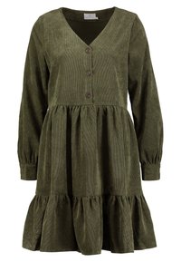 Robe en velours côtelé verte avec décolleté en V, manches longues et ourlet à volants en couches. Comprend quatre boutons marron sur le devant.