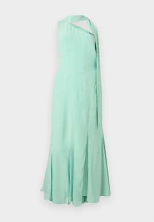 Μέντα πράσινο αμάνικο φόρεμα με έναν ώμο με drape και φαρδύ τελείωμα, κατασκευασμένο από ελαφρύ ρέον ύφασμα.