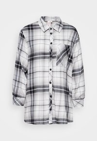 Camicia di flanella a scacchi bianco e nero, maniche lunghe, chiusura con bottoni, taschino sul petto, tessuto leggero e morbido, design casual.