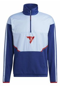 Veste à enfiler bleu et bleu clair avec col montant, fermeture éclair, poche avant, accents rouges et un logo sur la poitrine.