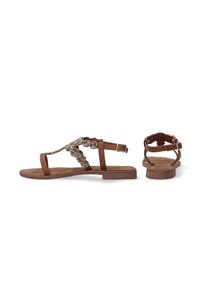 Brune sandaler med flade såler, der har dekorative perlebesatte stropper, justerbar ankelrem og en tekstureret fodseng.