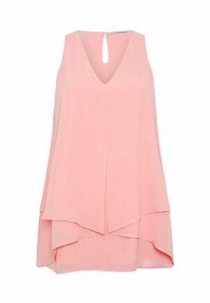 Light pink sleeveless top made of a flowy material, featuring a V-neck and keyhole design at the back, with layered hem detailing.