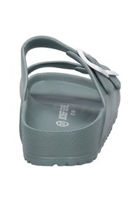 Grey slip-on sandal with a textured footbed, rounded shape, and a white accent featuring a floral design on the strap.