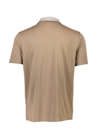 Beige polo t-shirt med en kontrasterande vit krage och subtila detaljer. Kortärmad och med en mjuk textur. Enkelt, klassiskt design.