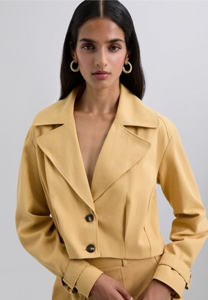 Lichte jas - mustard