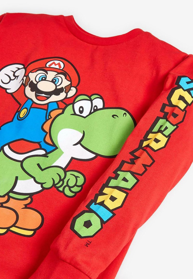 Sweat-shirt Super Mario Bros Noël Manches Longues Taille XS - Occasion Très Bon état