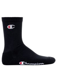 Schwarze Baumwollsocke mit geripptem Muster, ausgestattet mit einem gewebten weißen "Champion"-Logo und rotem Akzent am Knöchel. Standard Crew-Länge.