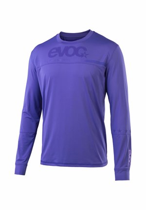 Purple long-sleeve athletic shirt with crew neck, faint "evoc" logo across chest and lower sleeve, and small star designs on right arm.